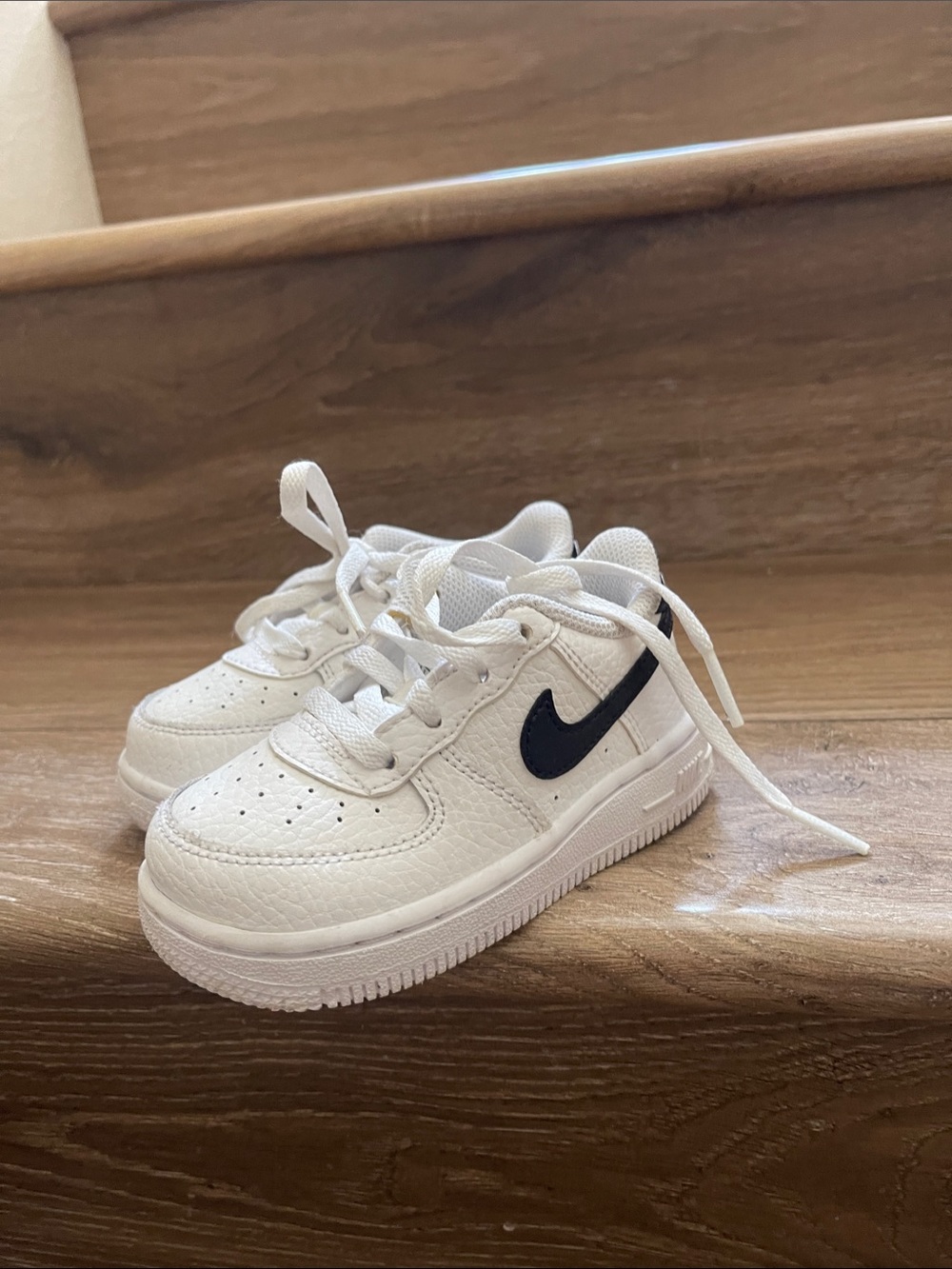 Nike White Air Force 1 Kids Sneakers with Black Swoosh